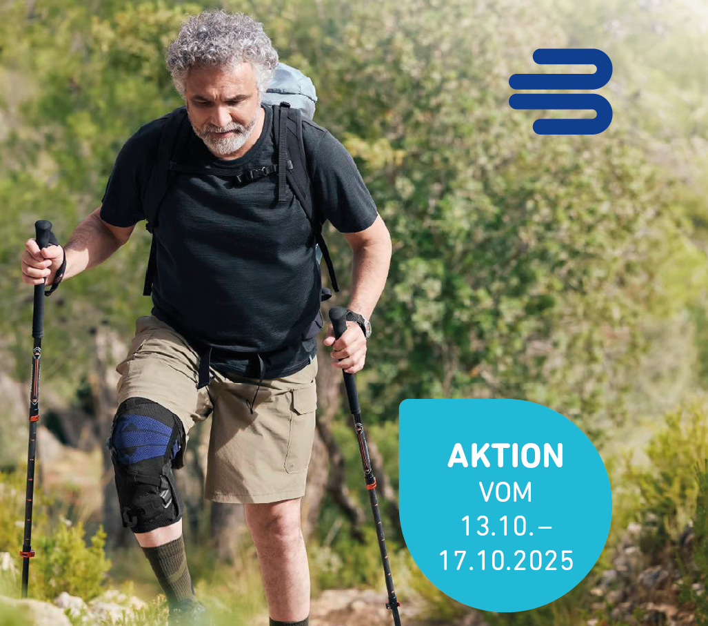 Aktionstage Riedel Auf dem Foto sieht man einen Mann beim Wandern, der die neue Knie-Orthese GenuTrain® OA von Bauerfeind trägt.