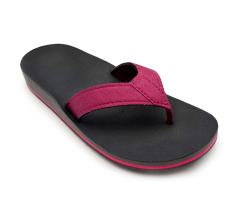 Flip-Flops, Sanitätshaus, Orthopädietechnik, Einlagen, Handwerk, Riedel Orthopädie, Gesundheit Auf dem Foto sieht man einen unserer individuellen Flip-Flops. Die Sohle ist schwarz, mit einem pinken Streifen in der Mitte und der Zehensteg ist ebenfalls pink.